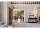 Charming dining area with view into kitchen, featuring hardwood floors and natural light at 14150 Foothill Ln, Golden, CO 80401
