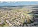 Suburban aerial view shows the property's location, surrounding neighborhood, and nearby green spaces at 2736 Poplar Grove Pl, Castle Rock, CO 80109
