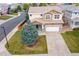 Two-story house featuring a well-manicured lawn, a two-car garage, and cozy front porch at 2736 Poplar Grove Pl, Castle Rock, CO 80109
