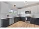 Modern kitchen boasts sleek countertops, stainless steel appliances, and ample cabinet space at 2736 Poplar Grove Pl, Castle Rock, CO 80109