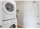 Convenient laundry room with stacked washer and dryer at 2736 Poplar Grove Pl, Castle Rock, CO 80109
