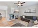 Cozy living room with a fireplace, modern decor, and an inviting atmosphere for relaxation at 2736 Poplar Grove Pl, Castle Rock, CO 80109