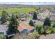 A lovely aerial view of the home in a well-situated neighborhood and a large field at 8679 Apache Plume Dr, Parker, CO 80134