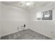 Neutral bedroom with light gray walls and a window at 8679 Apache Plume Dr, Parker, CO 80134