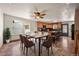Cozy dining area with modern table and chairs, adjacent to the kitchen and bathed in natural light at 8679 Apache Plume Dr, Parker, CO 80134