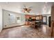 Open kitchen with stainless steel appliances, island seating, and easy access to the dining area at 8679 Apache Plume Dr, Parker, CO 80134