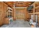 Organized shed with ample storage space, featuring shelving units and a clean concrete floor at 8679 Apache Plume Dr, Parker, CO 80134