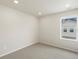 Neutral bedroom with carpet and a window at 6571 N Malaya St, Aurora, CO 80019