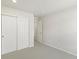 Bedroom featuring closet, neutral walls, and carpet at 6571 N Malaya St, Aurora, CO 80019