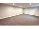 Unfinished basement featuring neutral walls, carpet flooring and recessed lights at 6586 W Leawood Dr, Littleton, CO 80123