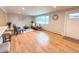 Inviting living area with hardwood floors, stylish furniture, and lots of natural light at 6586 W Leawood Dr, Littleton, CO 80123