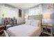 Cozy bedroom with natural lighting and playful decor, creating a cheerful space at 12167 E Exposition Ave, Aurora, CO 80012