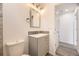 Cozy bathroom with updated vanity, stylish lighting and mirror at 10763 Lewis Cir, Broomfield, CO 80021