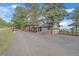Charming home featuring mature trees, private drive and deck with mountain views at 25601 Centennial Trl, Golden, CO 80401