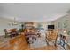 Comfortable living room with hardwood floors, a large window, and a cozy atmosphere at 25601 Centennial Trl, Golden, CO 80401