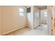 Cozy bedroom featuring neutral carpet, closet and a window at 303 Diablo Pl, Brighton, CO 80603