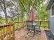 Spacious back deck with outdoor seating, ideal for relaxing and entertaining with scenic views at 11523 Sandy Creek Ln, Parker, CO 80138