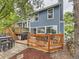 This home features multiple wooden decks and a brick patio, perfect for outdoor entertaining at 11523 Sandy Creek Ln, Parker, CO 80138