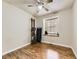 Bedroom with hardwood floors and a sunlit window perfect for plants at 11523 Sandy Creek Ln, Parker, CO 80138