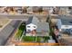 Bird's-eye view of the property with artificial turf in the backyard, an outdoor patio, and neighborhood views at 16402 E Tennessee Ave, Aurora, CO 80017