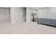 Finished basement, featuring a bedroom area and stairs at 9573 Castle Ridge Cir, Highlands Ranch, CO 80129