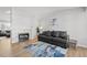 Living room featuring a fireplace and comfy seating at 9573 Castle Ridge Cir, Highlands Ranch, CO 80129