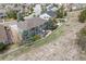 Aerial view of the backyard with privacy fence and large deck perfect for outdoor entertaining at 8406 Winter Berry Dr, Castle Pines, CO 80108