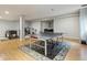 Finished basement featuring ping pong table, workout equipment, and open layout for entertaining at 8406 Winter Berry Dr, Castle Pines, CO 80108