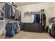 Spacious walk-in closet featuring ample shelving and hanging storage space at 8406 Winter Berry Dr, Castle Pines, CO 80108