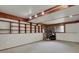 A large finished basement with wood accents, faux fireplace, and room for relaxing at 784 W Sterne Pkwy, Littleton, CO 80120