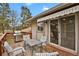 Inviting deck with outdoor furniture and awning, perfect for enjoying the outdoor scenery and alfresco dining at 784 W Sterne Pkwy, Littleton, CO 80120