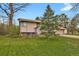 Charming home featuring a well-maintained front yard and an attached two-car garage at 784 W Sterne Pkwy, Littleton, CO 80120