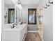 Beautiful bathroom features a double vanity, a soaking tub and a glass enclosed shower at 15295 E Cherry Creek S Rd, Larkspur, CO 80118