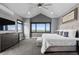 Spacious main bedroom with scenic views, TV and vaulted ceilings at 15295 E Cherry Creek S Rd, Larkspur, CO 80118