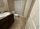 Contemporary bathroom featuring a vanity with sink, toilet, and shower at 4746 Raven Run, Broomfield, CO 80023