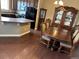 Well-lit dining room with wooden flooring, and plenty of space at 4746 Raven Run, Broomfield, CO 80023