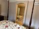 View from the bedroom into the main bathroom showing a tub and shower at 4746 Raven Run, Broomfield, CO 80023