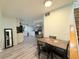 Open dining area with stairs at 2050 Lake Circle Dr, Thornton, CO 80241