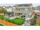 Aerial view of the backyard with a built in grill, patio, and outdoor seating area at 16060 Fairway, Commerce City, CO 80022