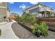 Backyard area with raised garden beds on a path at 16060 Fairway, Commerce City, CO 80022