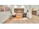 Cozy sitting area with comfortable chairs and a decorative bookshelf at 16060 Fairway, Commerce City, CO 80022