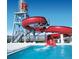 Fun waterslide and pool area with a water tower, perfect for recreational activities at 16060 Fairway, Commerce City, CO 80022