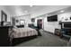 Spacious bedroom with large TV, vaulted ceiling, and walk-in closet at 6360 W 1St Ave, Lakewood, CO 80226