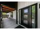 Contemporary front door with sidelights offering an inviting entrance and an interesting design at 6360 W 1St Ave, Lakewood, CO 80226