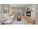Inviting living space with hardwood floors, modern fireplace, lots of natural light and stylish decor at 4580 S Huron St, Englewood, CO 80110