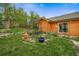 Charming backyard with a decorative gazebo, grass lawn, and well-maintained landscaping at 1415 Isabell St, Golden, CO 80401
