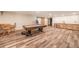 Finished basement featuring a pool table, bar area, and wood-look vinyl floors at 1415 Isabell St, Golden, CO 80401