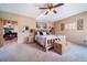 Cozy bedroom featuring a wood-frame bed, wood accents, and soft carpeting at 1415 Isabell St, Golden, CO 80401