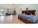 Bright bedroom with vaulted ceiling and comfortable seating area, features direct access to the outside at 1415 Isabell St, Golden, CO 80401