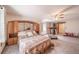 Comfortable bedroom with a unique bed frame, a ceiling fan, and fitness equipment at 1415 Isabell St, Golden, CO 80401
